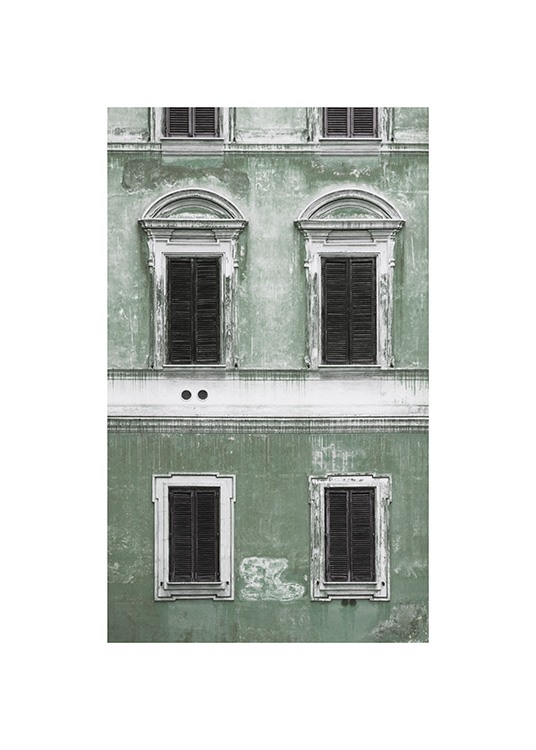  – Fotografia di una facciata verde con un look vintage e finestre con dettagli bianchi e neri